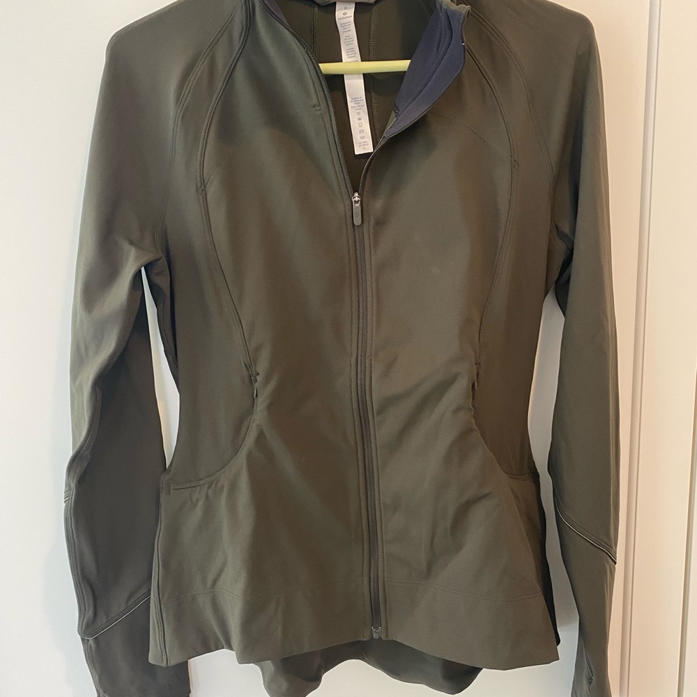 Lululemon size 8 peplum jacket.  Olive green in color